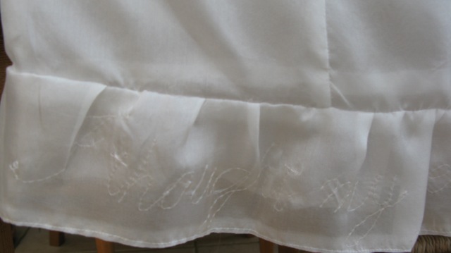 Detail showing the words on the hem of Ronnie's piece